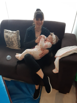 Georgina caring for a little one